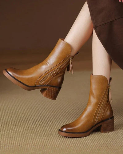 Noreen™ | Black leather boots with a comfortable heel, elegant and timeless