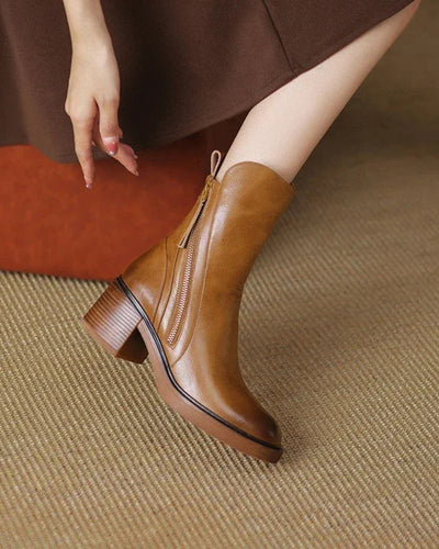 Noreen™ | Black leather boots with a comfortable heel, elegant and timeless